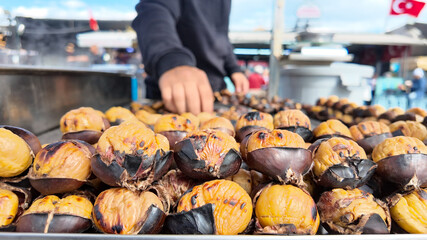 Roasting chestnuts at a street market in Turkey