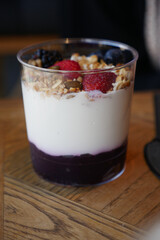 Delicious fruit and yogurt parfait in a clear cup