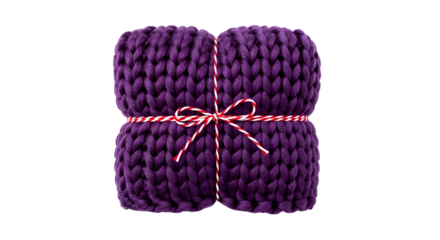 Gift - Purple chunky knit blanket tied with red and white twine on black background, cozy gift idea for winter or housewarming