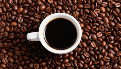 White Cup of Hot Black Coffee Surrounded by Brown Coffee Beans