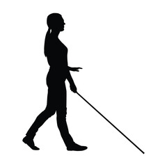 Silhouette of a Blind Woman Walking, Using a Long Cane for Mobility and Guidance.
