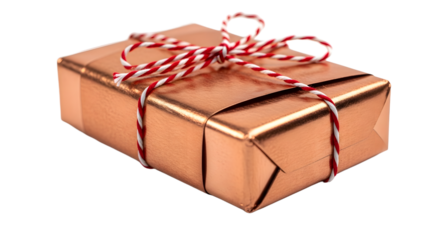 Gift - Small copper gift box wrapped with red and white striped twine bow, isolated on black background, perfect for holiday or birthday presents