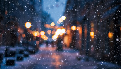 Softly falling snow illuminates a blurry city street at dusk