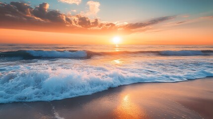 A stunning sunset over the ocean with foamy waves crashing on the sandy shore.