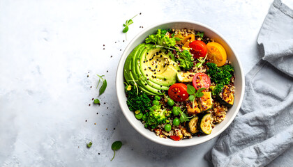 Healthy quinoa salad with fresh vegetables and grilled chicken