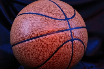 Basketball game ball on black background