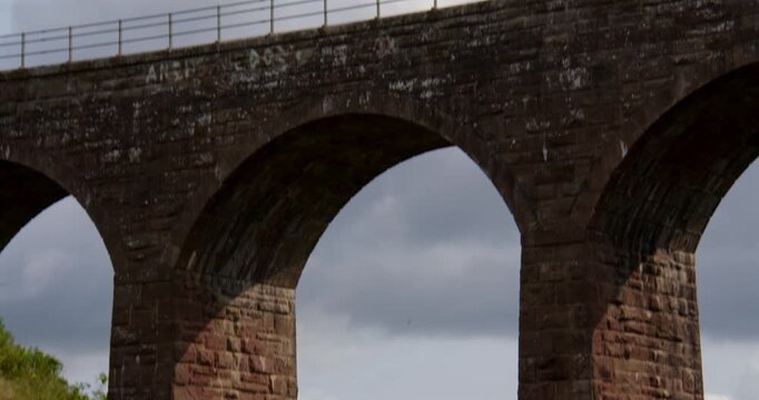 Tilting up shot of The North Water Viaduct, disused railway viaduct on the north river esk. next to the A92