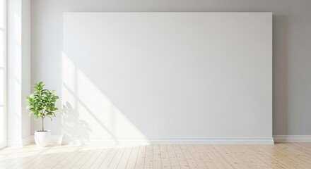 A minimalist white room with a large blank white wall, a potted plant, and a wooden floor.