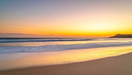 Golden Sunset Over a Serene Beach With Gentle Waves Washing Ashore Reflecting Warm Light on Wet Sand and Distant Coastal Town