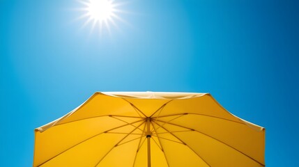 Relaxing under a vibrant yellow beach umbrella with bright sunshine and clear blue skies promising a perfect summer vacation getaway