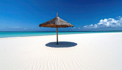 Secluded Tropical Beach Paradise with a Thatched Umbrella Under a Bright Blue Sky and Calm Turquoise Ocean Waters