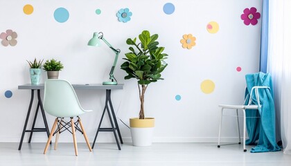 A serene and colorful room with a desk, plants, and decorative wall accents