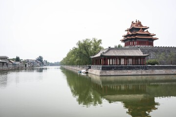 Fototapeta premium Corner Watchtower (Jiao Lou) and Moat of the Forbidden City