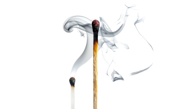Two matches, one burnt and smoking, against a black background, create a stark, dramatic image