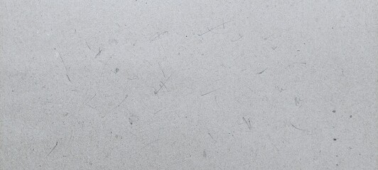 Fototapeta premium White craft paper surface texture. Vintage white grunge background with worn appearance.