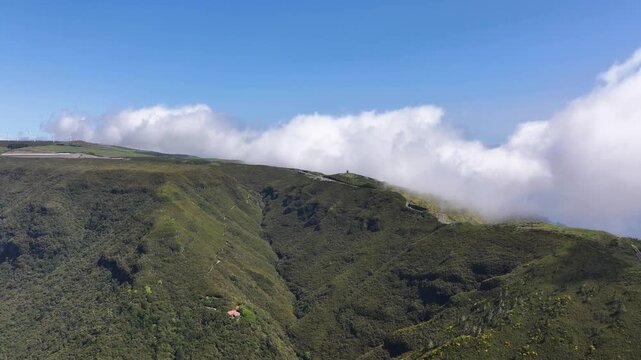 Levada das 25 Fontes and Risco falls hiking trail along valley, Madeira. Aerial