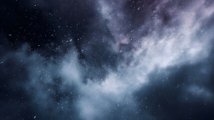 Obraz premium Dramatic dark and moody swirling clouds with falling white particles evoking a cosmic or winter atmosphere