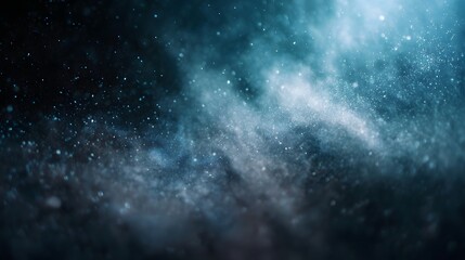 Fototapeta premium A mesmerizing view of a cosmic nebula filled with swirling clouds of dust and countless shimmering stardust particles under a deep dark sky