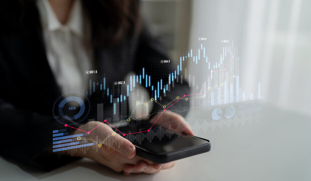 Business professional examines financial data on smartphone, showcasing modern technology and analytics in a dynamic business environment for strategic insights. Scalp