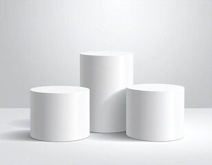 Three white cylindrical podiums on a white surface
