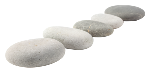 Smooth gray pebbles arranged in a line
