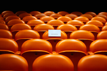 Fototapeta premium Reserved seating in an empty movie theater 