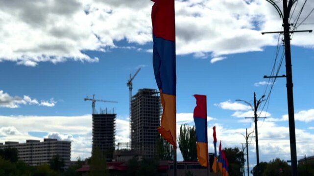 The flag of Armenia within the city limits of Yerevan, flag in Yerevan, Armenia. High 4k quality - Powered by Adobe