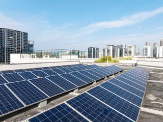 Fotobehang Muziek solar panel on roof top of apartment  © zhu difeng