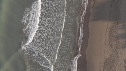 Drone flight over the seaside of the Tyrrhenian Sea near San Vincenzo, Tuscany, Italy