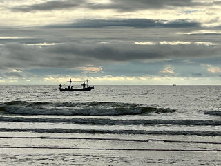 fishing boat at sunset