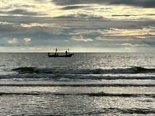 fishing boat at sunset