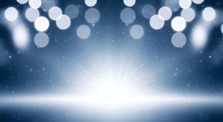Abstract blue bokeh background with light burst and glitter effect