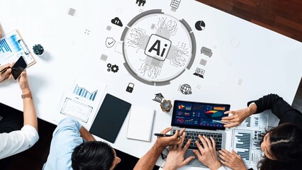 This engaging workspace features professionals collaborating over digital charts and data insights, showcasing artificial intelligence impact on modern business discussions. Raster