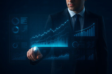 Businessman touching a glowing holographic financial dashboard with futuristic data charts