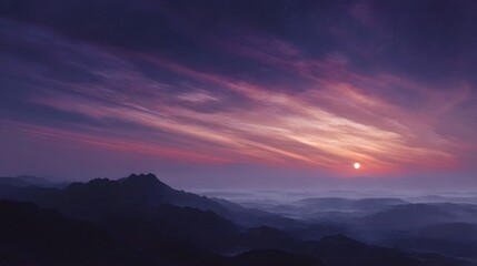 Fototapeta premium Serene mountain landscape with vibrant sunset clouds and atmospheric mist