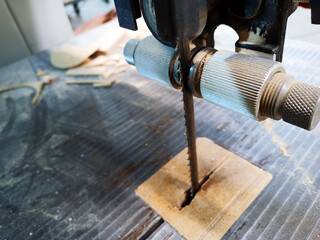 band saw in furniture production. close-up. curved  sawing