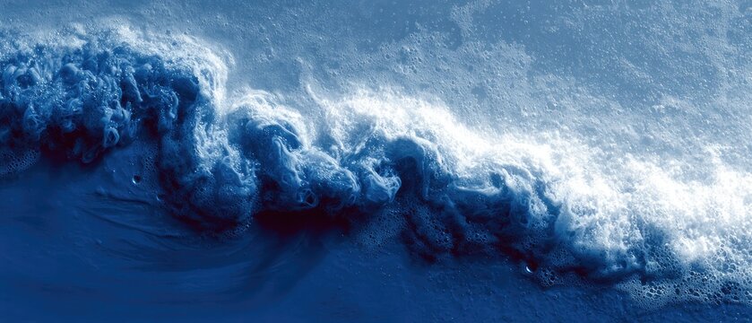 Swirling blue cloudscape across a landscape