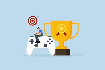 Gamification, man with computer laptop on game joystick with trophy award.