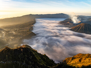 Fototapeta premium Aerial view Mountains at Bromo volcano during sunrise sky,Beautiful Mountains Penanjakan in Bromo Tengger Semeru National Park,East Java,Indonesia.Nature landscape background