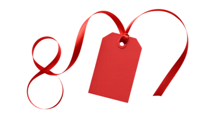 Elegant red ribbon curls around blank gift tag creating a festive and celebratory feel perfect for any special occasion