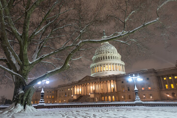 Washington DC in night winter. American Capitol Building in snow. Washington city Capitol. United...