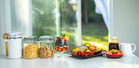 Breakfast with fruit. Healthy food concept. Cereals with fruit mix for breakfast. Fruit cocktail at kitchen. Morning breakfast. Fresh fruit blend with berries for breakfast.