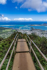 Fototapeta premium Haiku Stairs (Stairway To Heaven), Honolulu, Oahu, Hawaii. Koʻolau Range, shield volcano. Kāneʻohe Bay is argest sheltered body of water in the main Hawaiian Islands. This reef-dominated embayment 