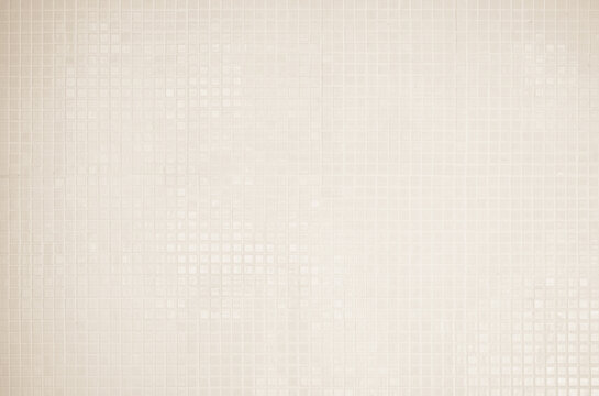 Cream light ceramic wall and floor tiles mosaic background in bathroom and kitchen. Design pattern geometric with grid wallpaper texture decoration pool. Simple seamless abstract surface clean.