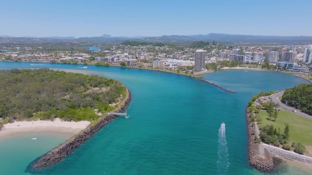 Aerial views of the Tweed Heads coast with Fingal Head to the south and Coolangatta to the north, the Tweed river inlet in the foreground and Tweed Heads and Coolangatta skyline in the background
