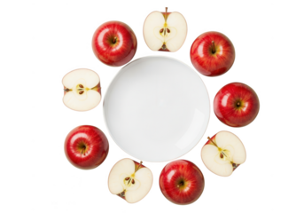 Red apples arranged around white plate isolated on transparent background