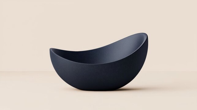 A dark blue, bowl-shaped object with a smooth surface and curved rim.