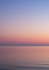 Obraz premium Abstract atmospheric scene of a soft, fluid boundary where the sky meets the water, vast blank field offering extensive copy space, simplicity, continuous, backdrop