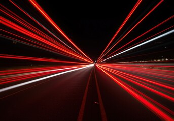 Abstract background featuring vibrant red and white streaks of flowing vehicle lights captured during a long nighttime exposure to create dynamic energy, energy, urban, background