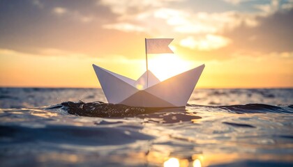 A white paper boat floats on golden water at sunset, cradling a crumpled note—evoking simplicity, reflection, and the poetic rhythm of quiet imagination.